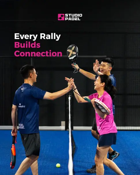 Players high-fiving at the net