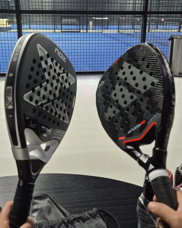 Two rackets against the court