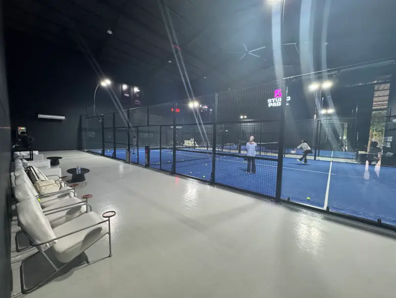 Lounge seating along the courts